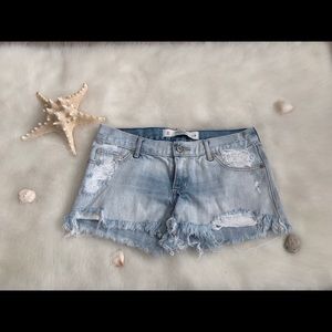 Light wash distressed shorts